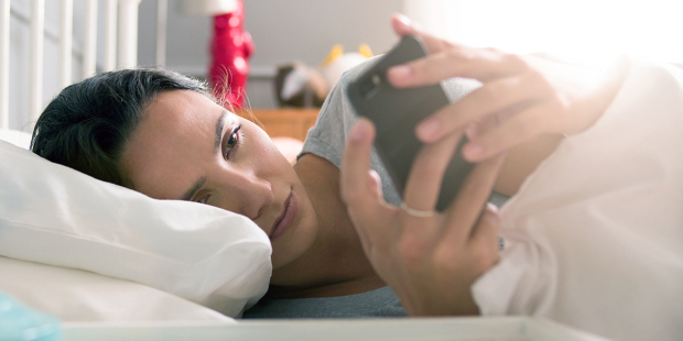 web3-woman-phone-bed-check-email-messages-shutterstock